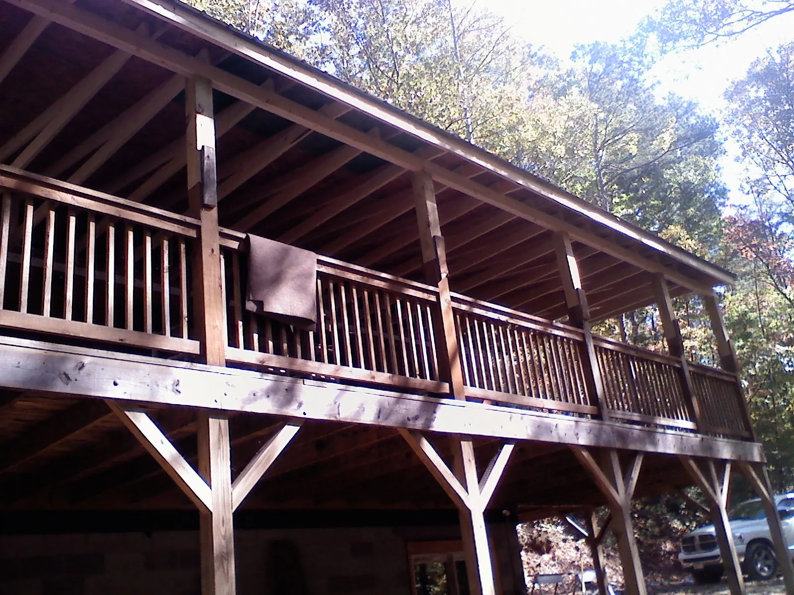 Timber framing under a new elevated porch and deck — Roof Leak Repair in Atkinson by Roofing Brothers